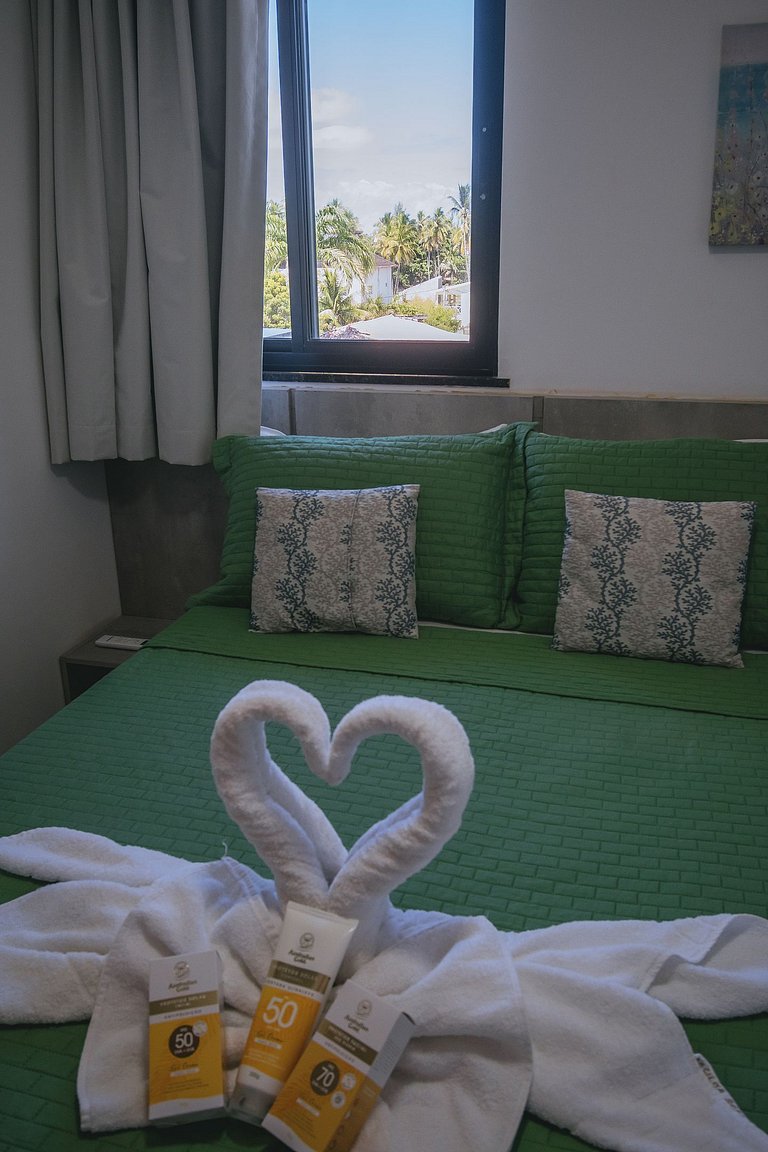 Apto estiloso com vista mar e piscina infinita