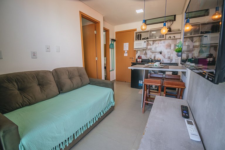 Apto estiloso com vista mar e piscina infinita
