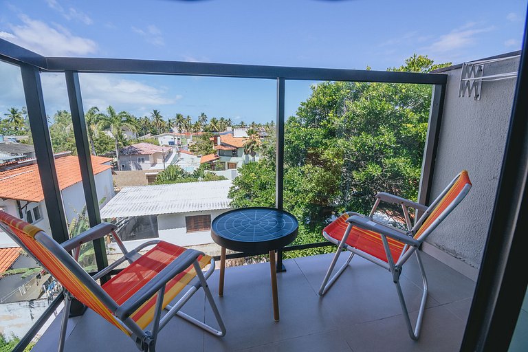 Apto estiloso com vista mar e piscina infinita