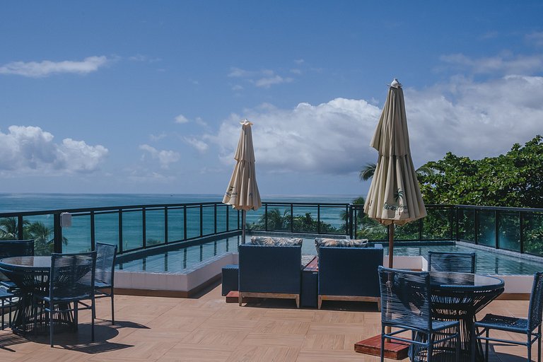Apto estiloso com vista mar e piscina infinita
