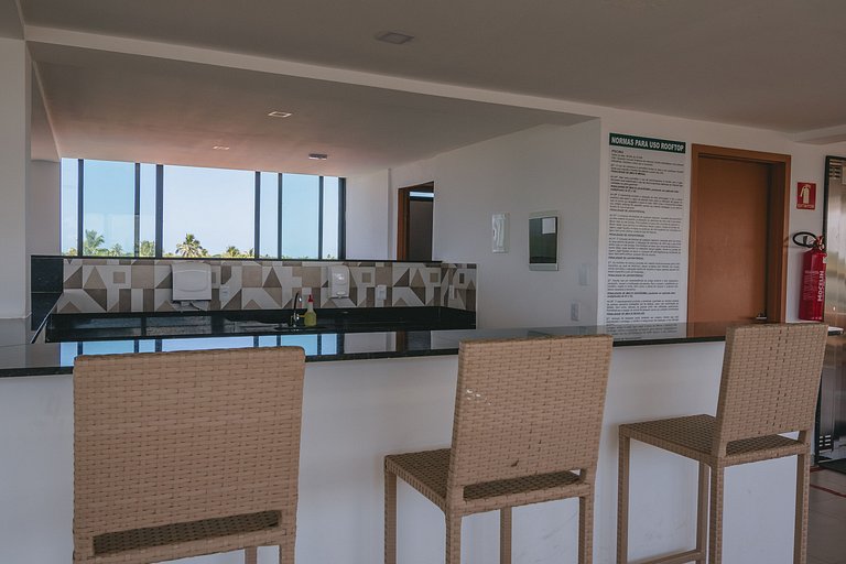 Apto estiloso com vista mar e piscina infinita