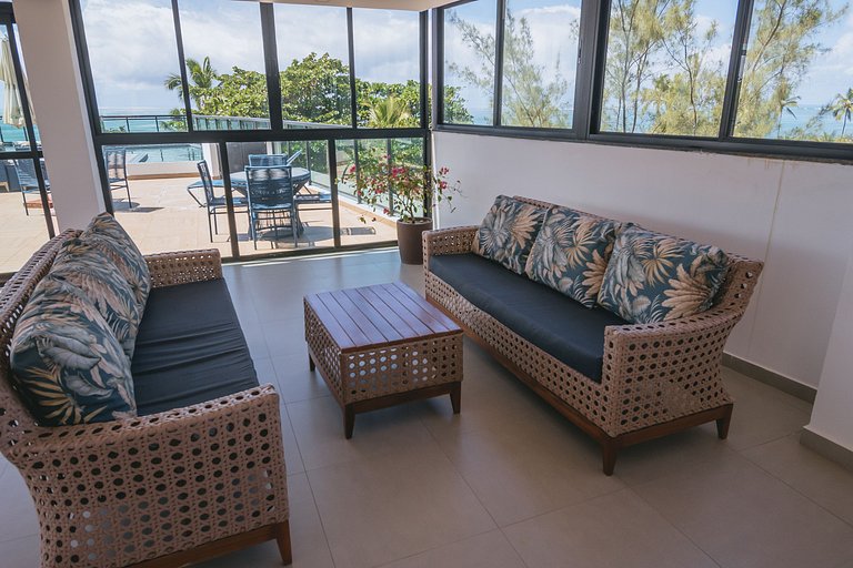 Apto estiloso com vista mar e piscina infinita