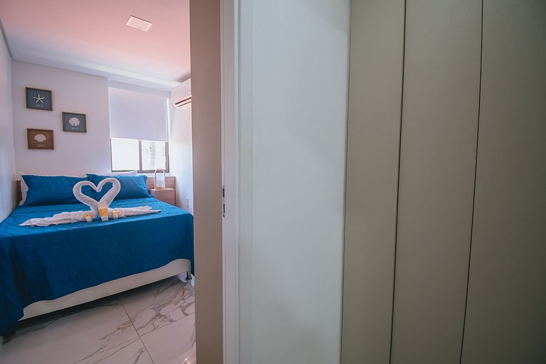 Flat elegante com rooftop e piscina vista mar