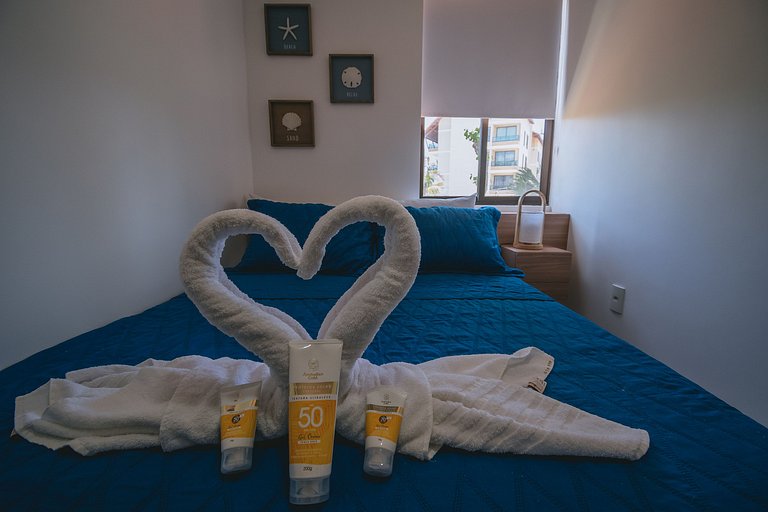 Flat elegante com rooftop e piscina vista mar