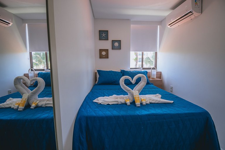 Flat elegante com rooftop e piscina vista mar