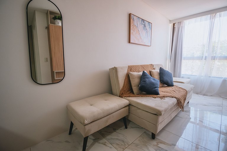 Flat elegante com rooftop e piscina vista mar