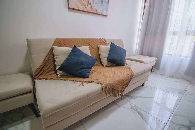 Flat elegante com rooftop e piscina vista mar