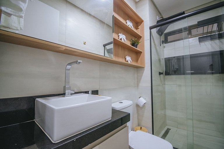Flat elegante com rooftop e piscina vista mar